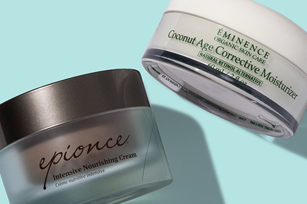 Éminence Coconut Age Corrective Moisturizer and Epionce Intensive Nourishing Cream on blue background
