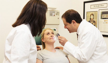 Study participant undergoing examination by Dr. Schlessinger.